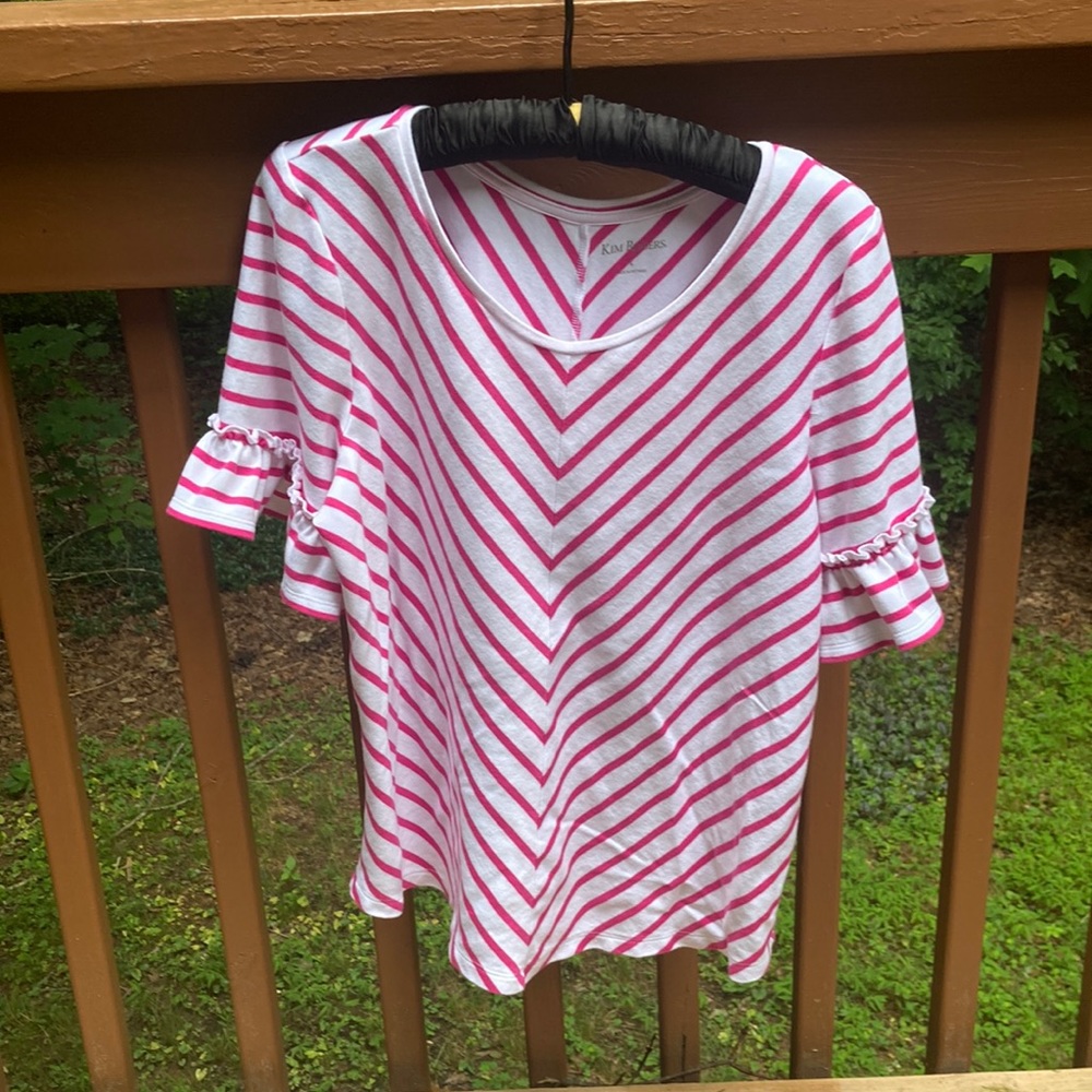 Kim Rogers pink and white ruffle shirt